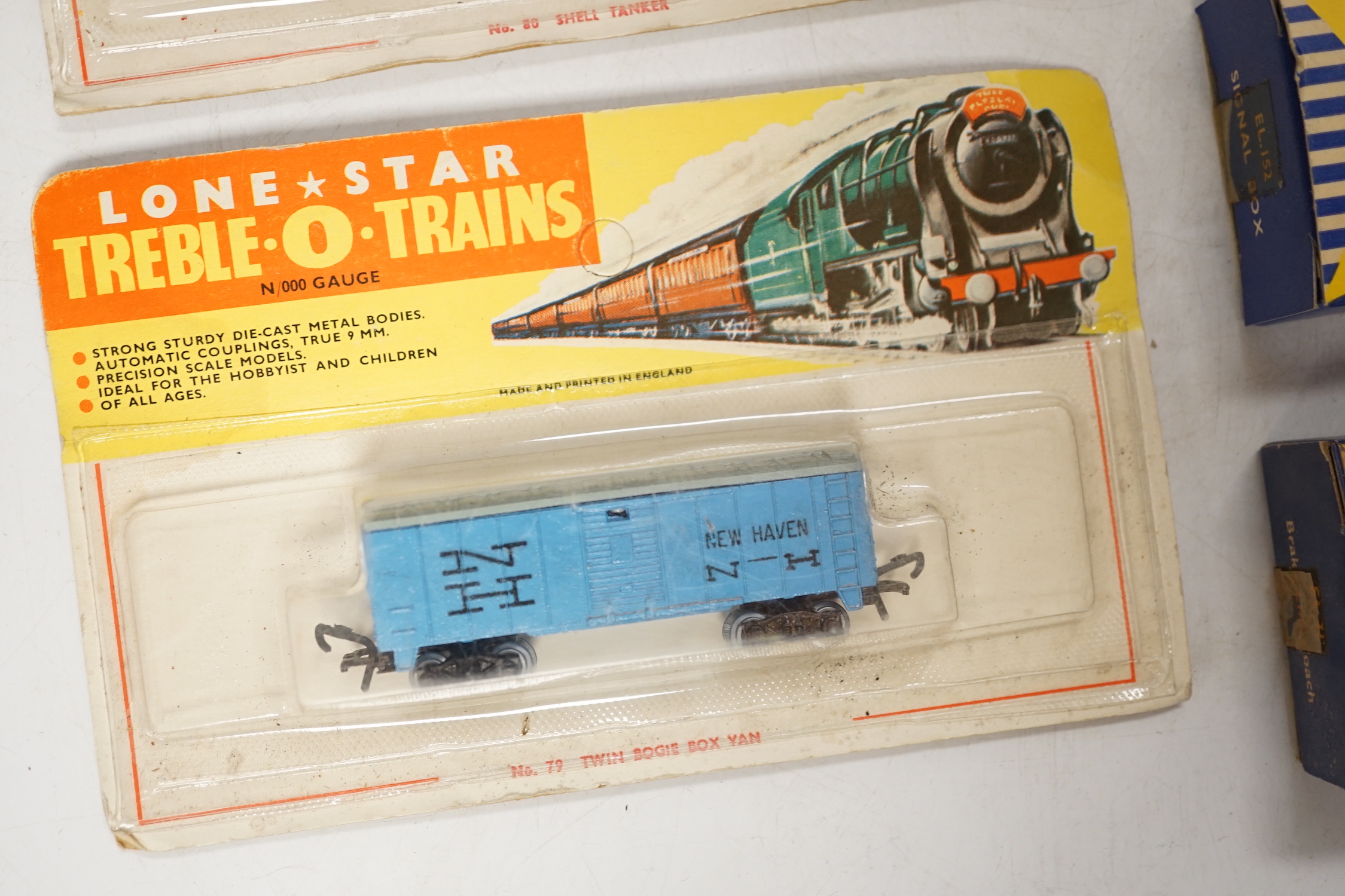 Sixty-two boxed items of Lone Star 000 gauge model railway including; a tunnel, Brake End Coaches, bogie wagons, station platforms, platform extensions, signal boxes, box vans, and telegraph poles